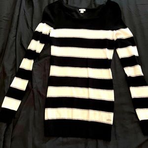 Long sleeve Guess shirt. Black and white stripes, with silver glitter stripes.